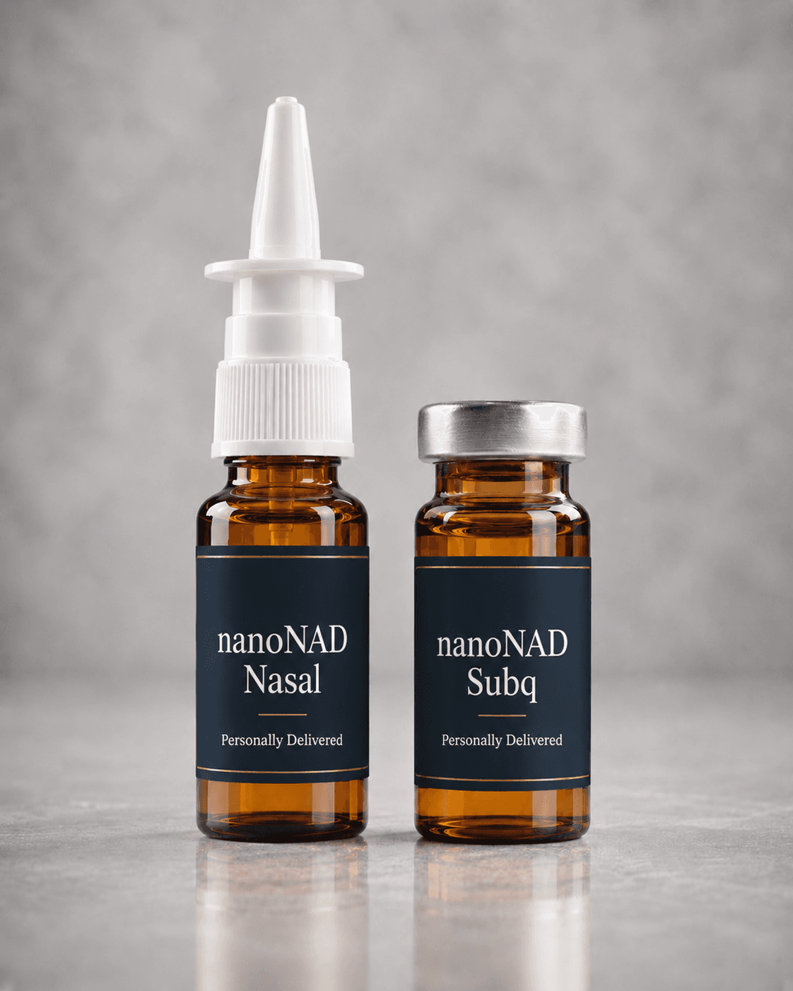 Crystal Clear RX Wellness NanoNAD nasal spray and injectable vial with navy Personally Delivered labels on pale stone.